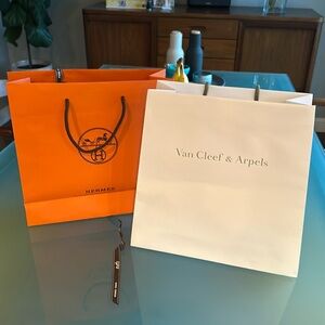 Hermes and Van Cleef paper bags